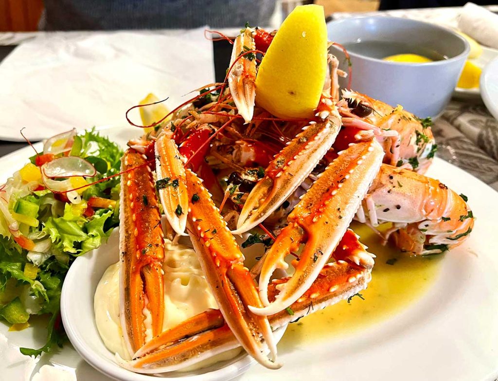 Serving suggestion - roasted langoustines with lemon mayonnaise and green salad.