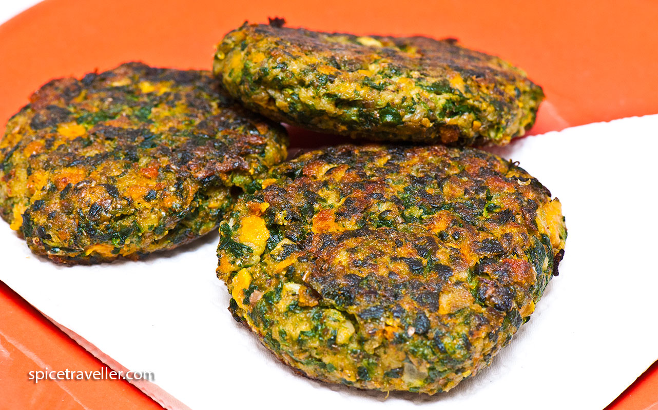 Delicious vegetarian burger with spinach and carrots