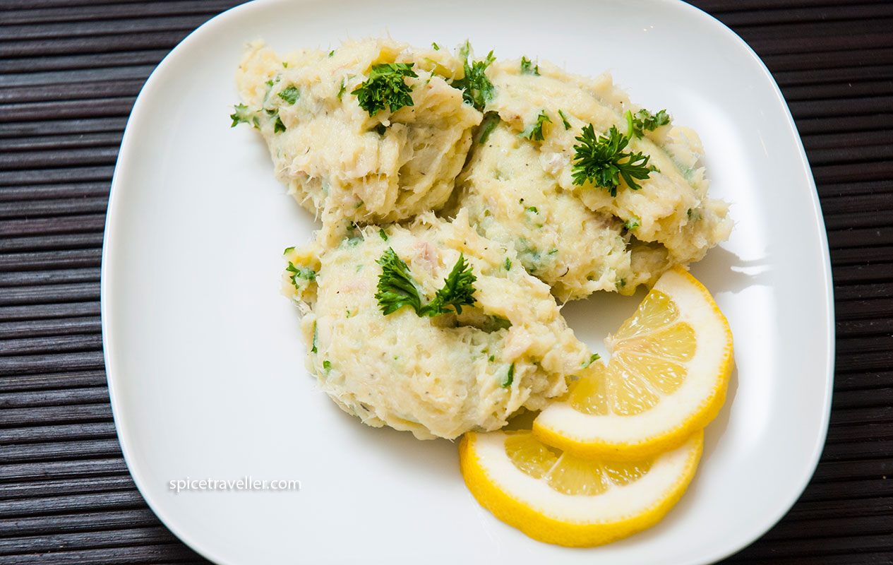 Baccala delicacy with parsley and lemon slices