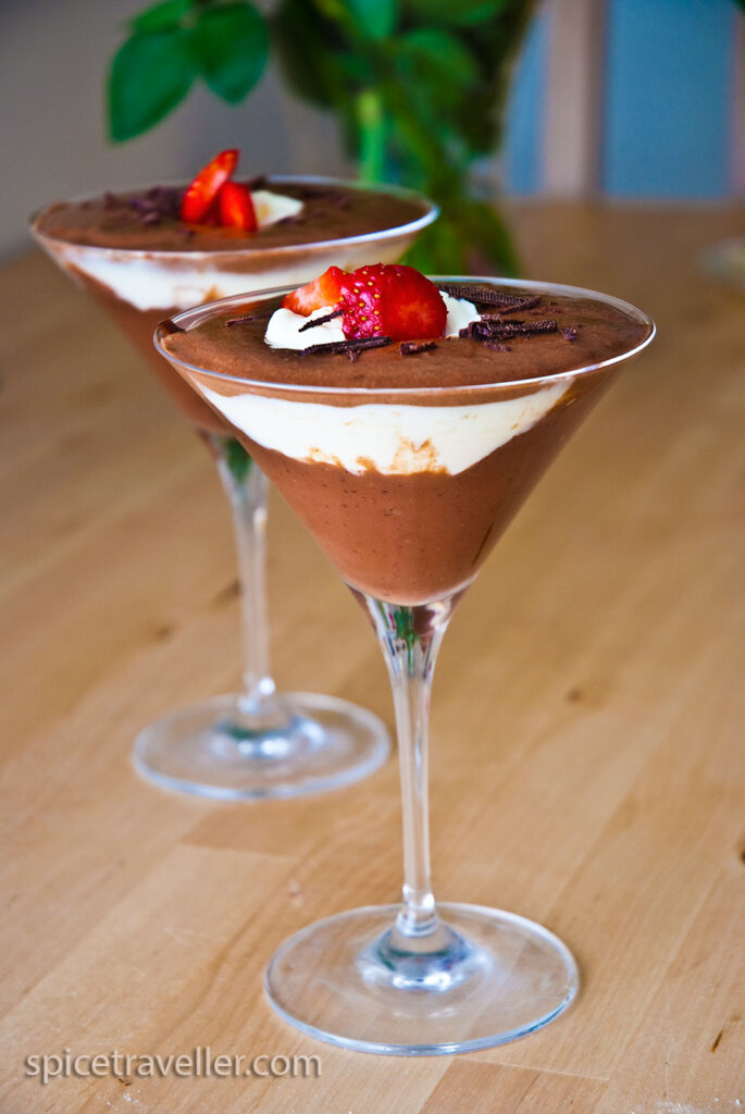 chocolate vanilla mousse dessert in martini glass