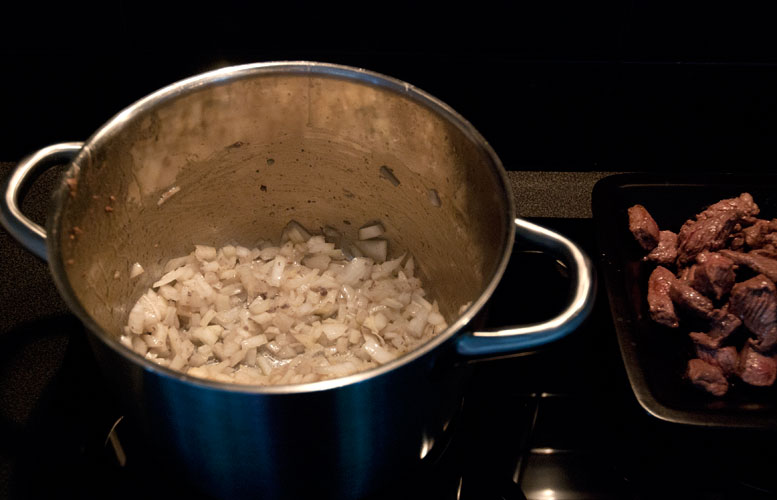 Chopped onions frying in a pot