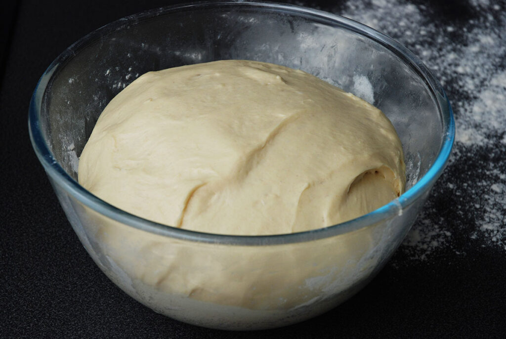layered butter bread dough rising