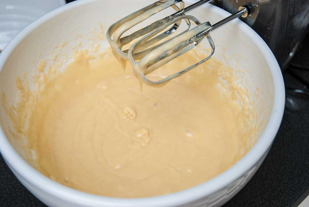 Batter for Halloween pumpkin and chocolate sponge cake. 