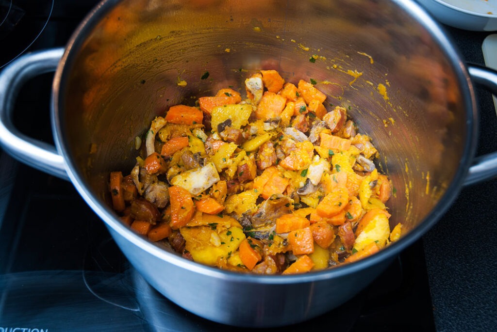 Cooking vegetables for Halloween pumpkin risotto