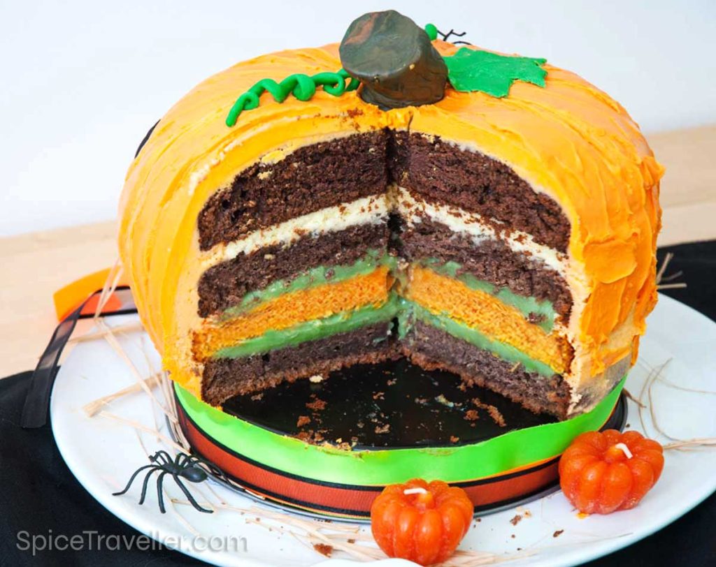 Sliced Jack-o-Lantern cake showing delicious layers of sponge cake and cream.