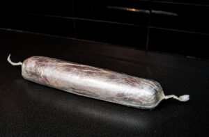 whole turkey roulade wrapped in cling film