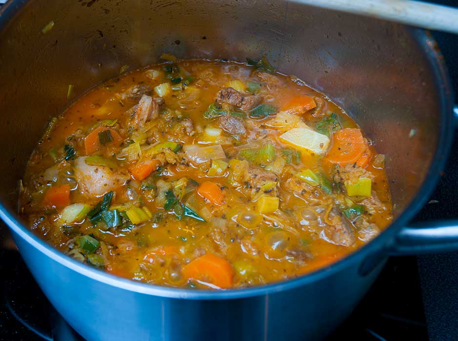 Simmering pork and leek stew