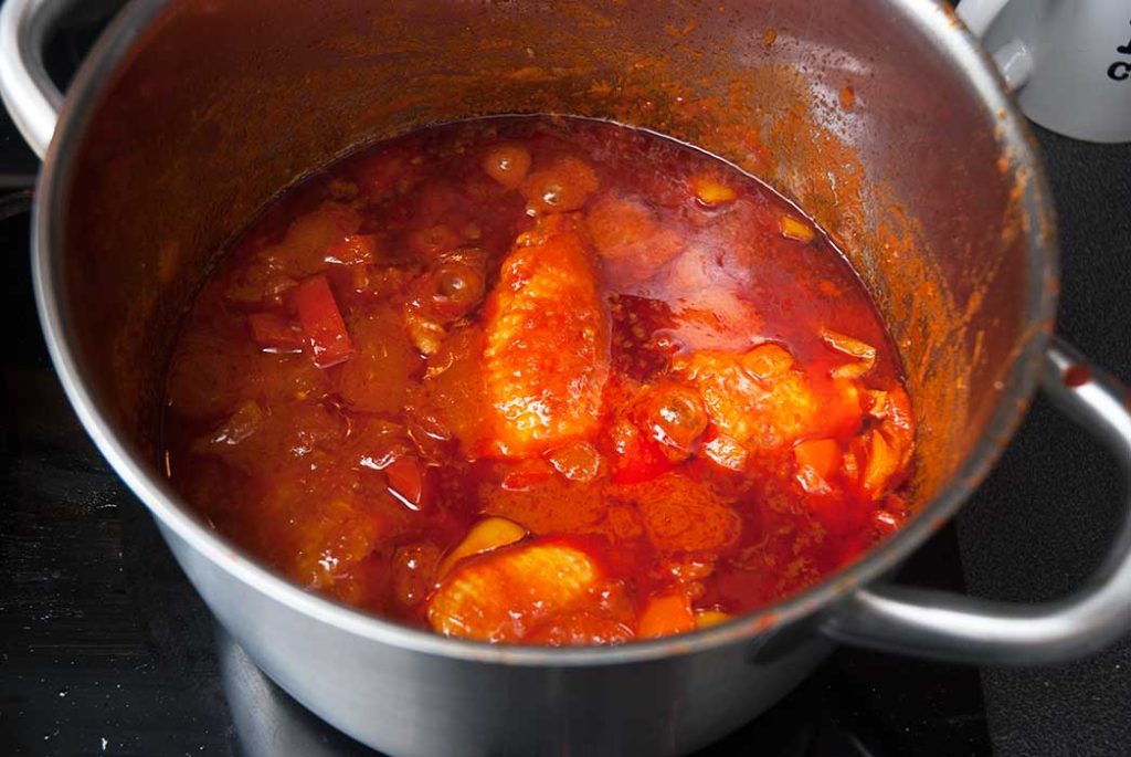  Hungarian chicken paprikash in a pot.