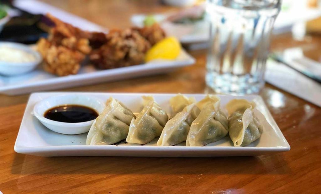 Simple Chinese dumplings served with soy sauce dip.