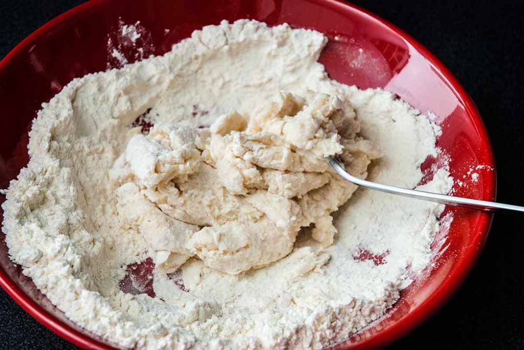 Mixing flour with hot water 