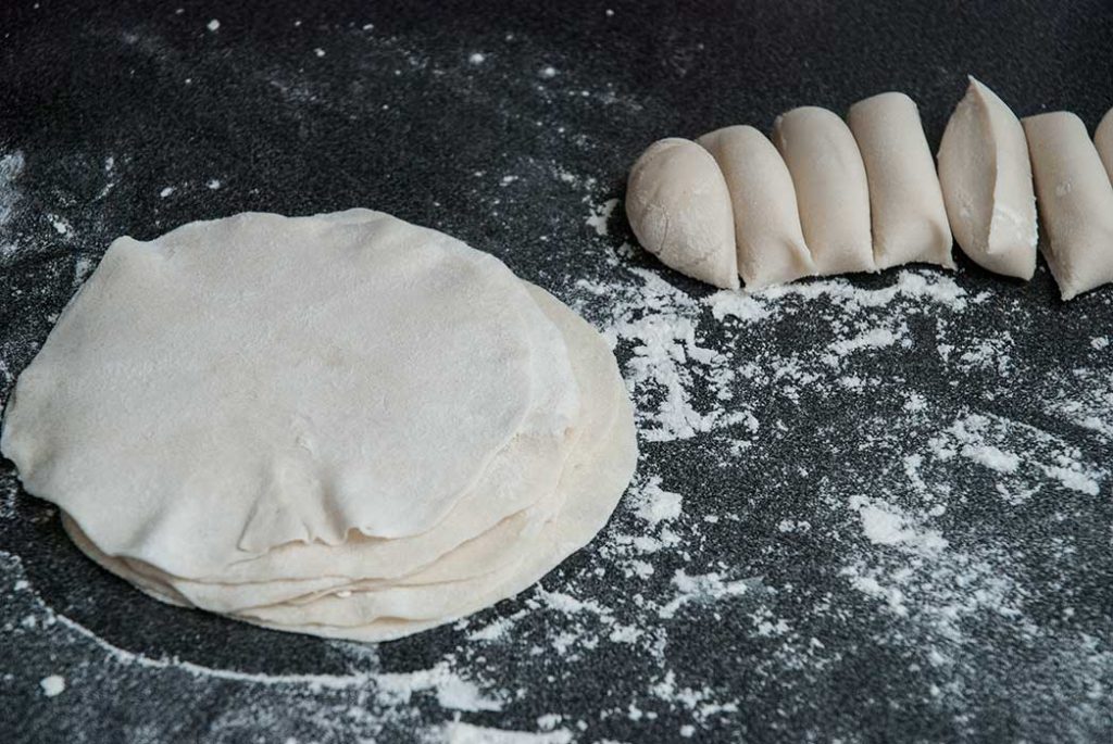 Stack of rolled dough pieces.