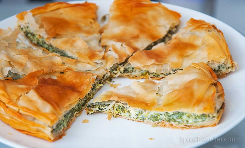 Perfetcly sliced spinach and cheese borek.