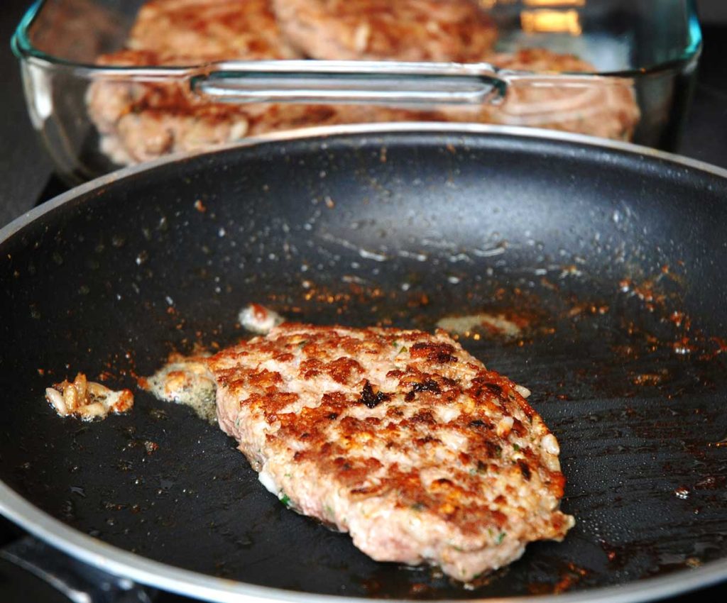 Minced beef burger fried on both sides.