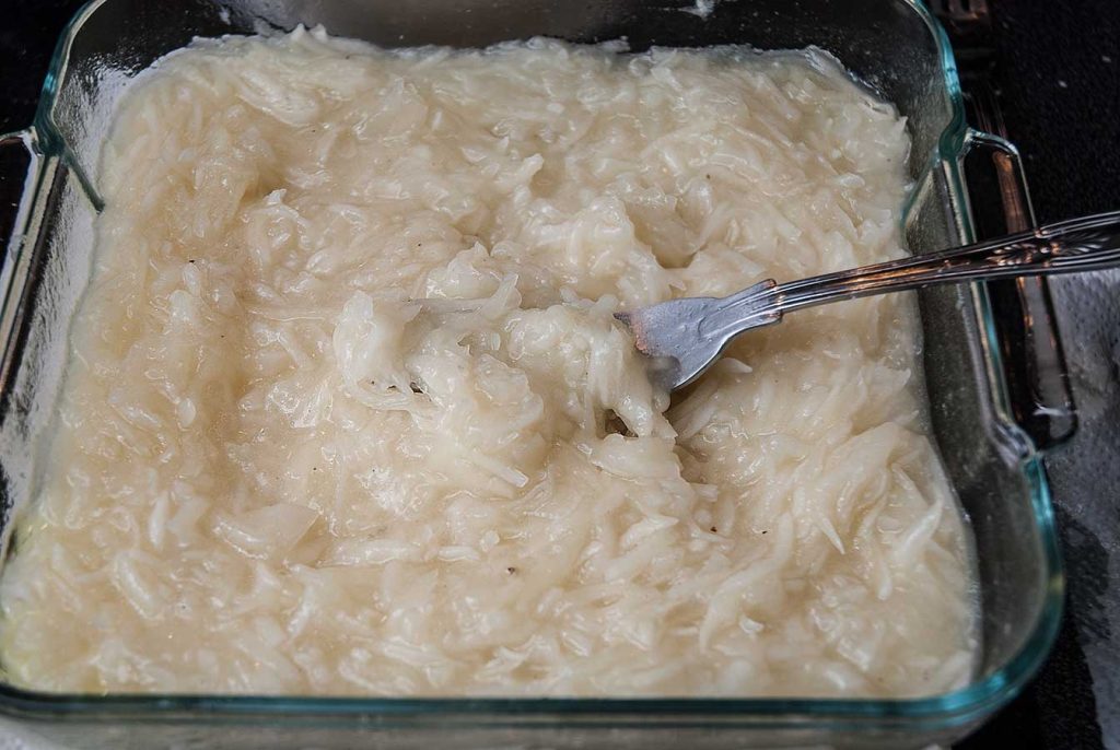 Grated potatoes ready to use for chicken and potato casserole or rappie pie.