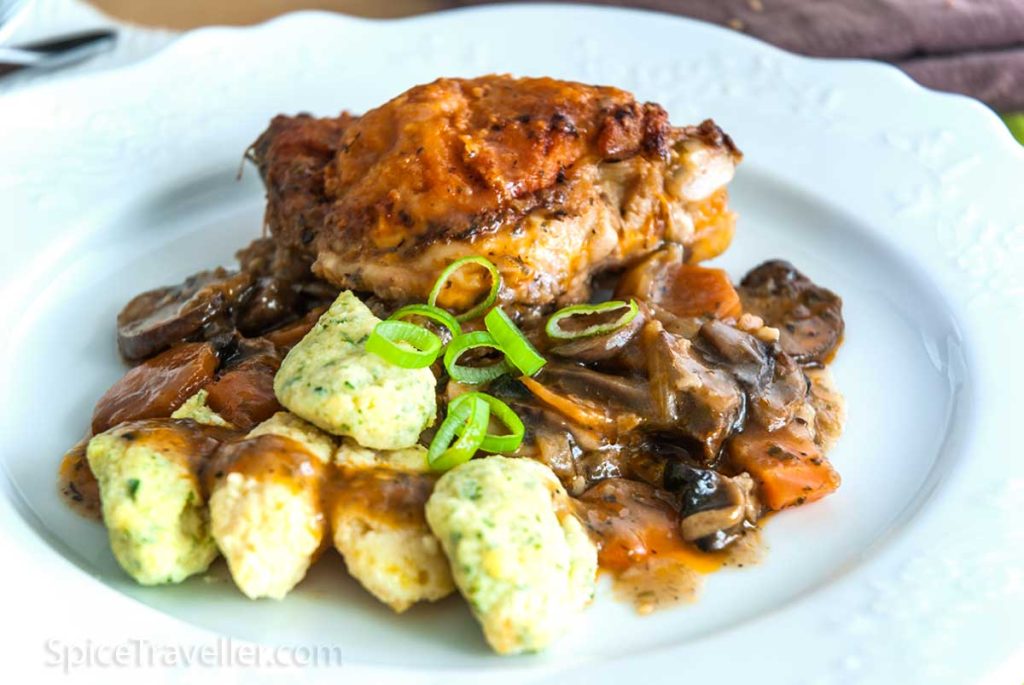 Close up of French Hunter's Chicken served with dumplings.