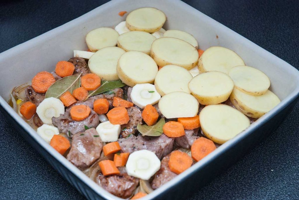 Added top layer of potato - lamb and potato bake.