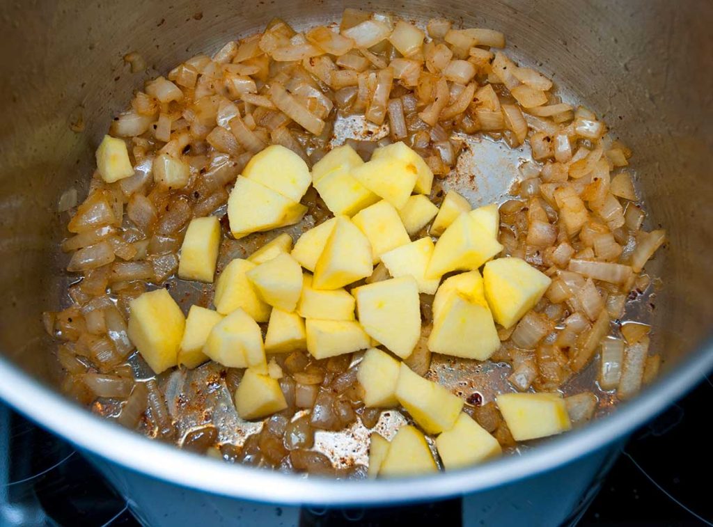 Frying onion and apples, the base for German style sauerkraut.