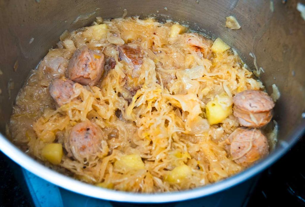 Frying sauerkraut together with meat.