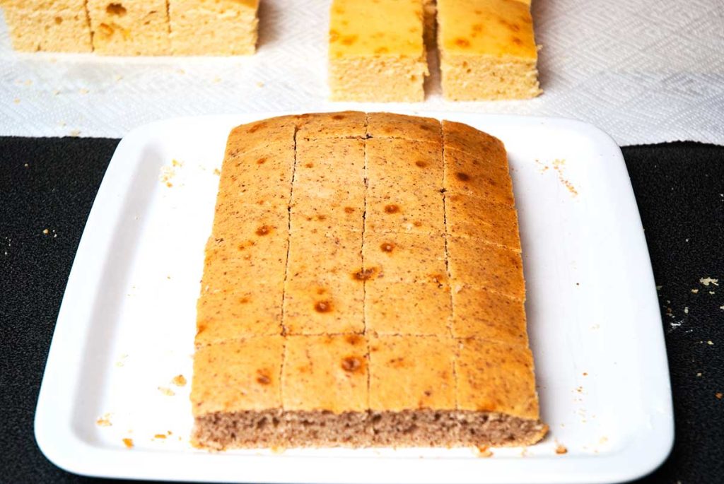 Sponge cake cut into squares.