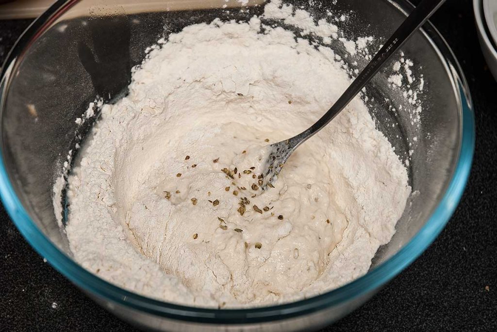 Making no-yeast dough for mini pizza cupcakes.