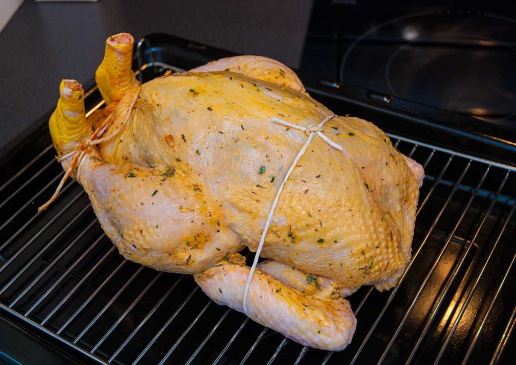 Chicken tied and ready to roast.