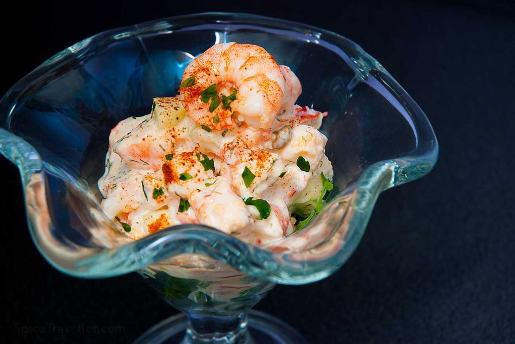 Close up of luxurious seafood cocktail with Thousand Island dressing. 