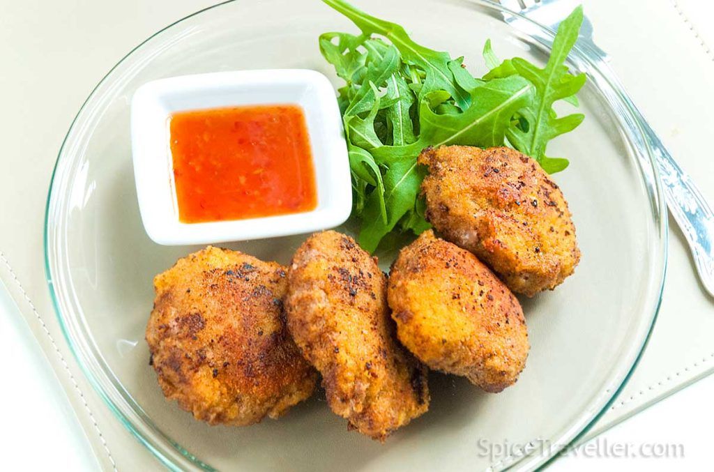 Australian beef patties - rissoles served with sweet chilli dipping sauce and wile rocket salad.