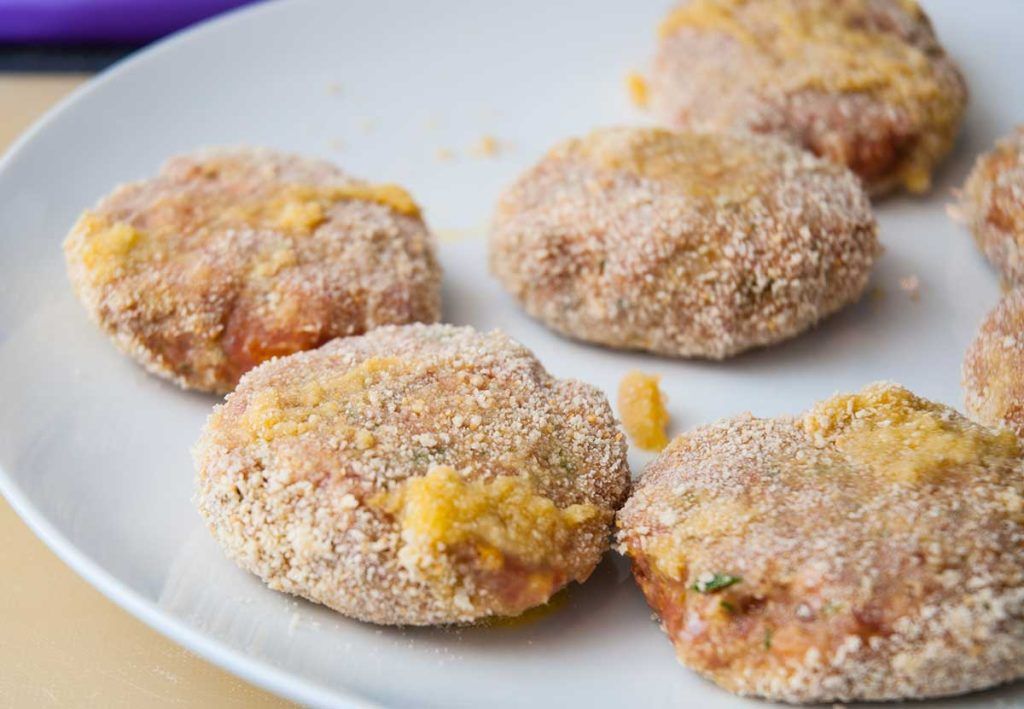 Breaded Australian rissoles ready to pan-fry.