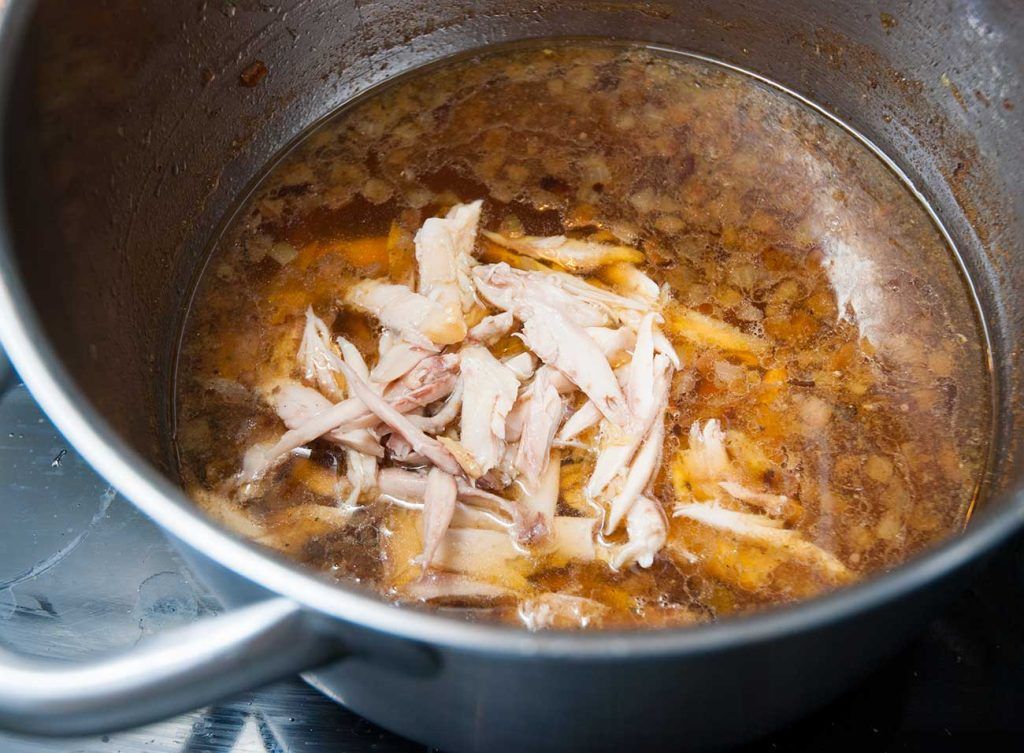 Stripped chicken wings meat added back to the pot.