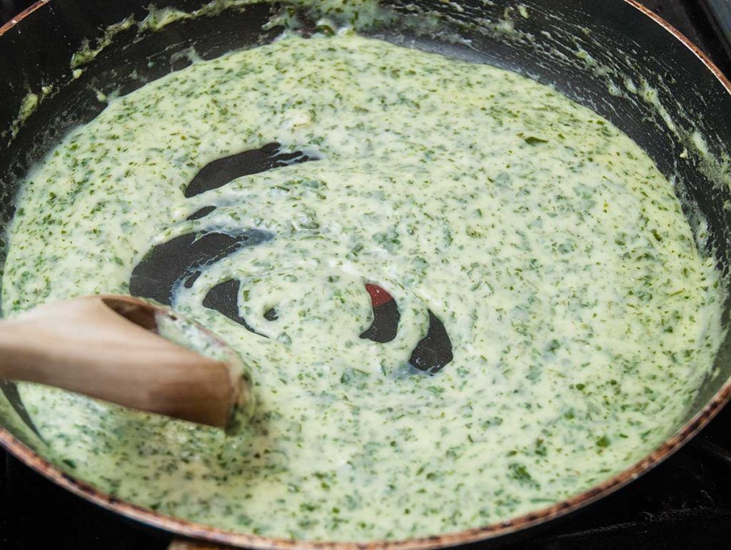 Creamy herb infused sauce ready to use.