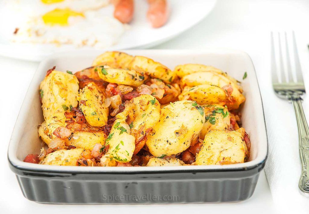 German fried potato with bacon and onions served as a side dish.