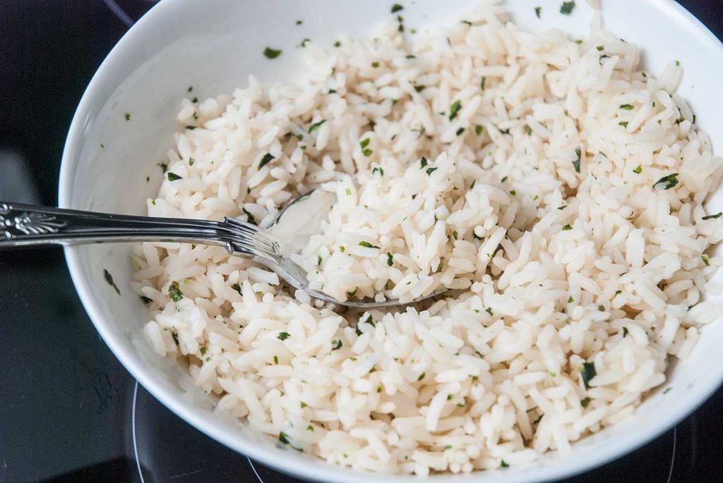 Close up of lime rice in a bowl.