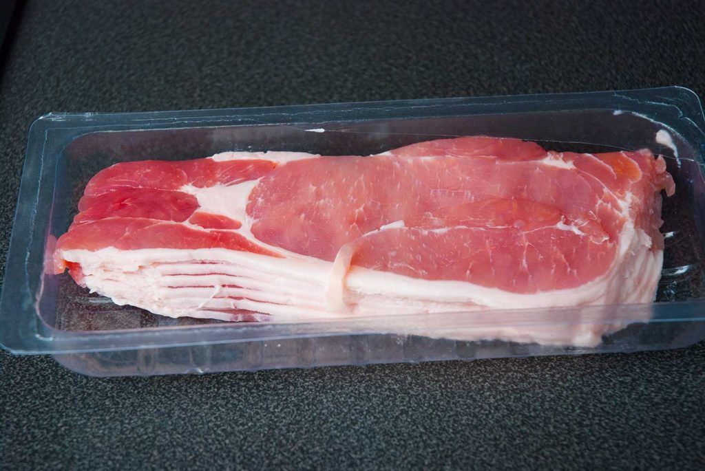 Raw bacon slices in packet for making Aussie damper bread.